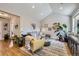Inviting living room with vaulted ceilings, hardwood floors, and stylish decor for relaxation and entertainment at 2841 N Columbine St, Denver, CO 80205
