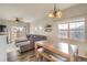 Open floor plan seamlessly connecting the living room and dining area, great for entertaining at 9335 Amison Cir # 203, Parker, CO 80134