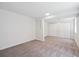 Spacious unfinished basement with neutral carpet and white walls at 1718 S Flanders Way, Aurora, CO 80017