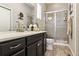 Modern bathroom with updated vanity, shower, and tile flooring at 20150 E Fair Ln, Centennial, CO 80016