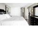 Bedroom with a comfortable bed, closet and door to the Primary bathroom at 909 N Logan St # 3A, Denver, CO 80203