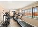 Well-equipped gym with treadmills, elliptical, and free weights at 909 N Logan St # 3A, Denver, CO 80203
