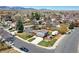 Suburban neighborhood with RV parking available behind a single Gathering home at 13915 W 73Rd Ave, Arvada, CO 80005