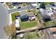 Aerial view of a charming home, featuring a spacious backyard and a relaxing outdoor deck at 13915 W 73Rd Ave, Arvada, CO 80005