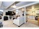 Finished basement features a living area, kitchenette, and plenty of space for entertainment at 13915 W 73Rd Ave, Arvada, CO 80005