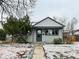 Charming single Gathering home with gray siding, landscaped front yard, and inviting walkway at 1170 Elmira St, Aurora, CO 80010