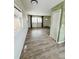 Cozy living room with new floors, big windows, and fresh paint at 1170 Elmira St, Aurora, CO 80010