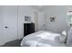 Cozy bedroom featuring a comfortable bed, neutral decor, and ample natural light at 6977 Copper Sky Cir, Castle Pines, CO 80108