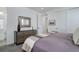 Bedroom featuring neutral colors, dresser and carpet at 6977 Copper Sky Cir, Castle Pines, CO 80108