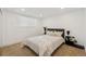 Cozy bedroom featuring neutral decor, a comfortable bed, and ample natural light at 252 N Pennsylvania St # 102, Denver, CO 80203