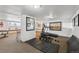 Well-equipped fitness area with a treadmill, elliptical machine, weights, and space for stretching, designed for healthy living at 252 N Pennsylvania St # 102, Denver, CO 80203