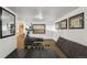 Bright fitness area featuring a treadmill, elliptical machine, weights, and mirrors, perfect for staying active and healthy at 252 N Pennsylvania St # 102, Denver, CO 80203