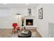 Cozy living room with a fireplace and modern decor, perfect for relaxing and entertaining at 252 N Pennsylvania St # 102, Denver, CO 80203
