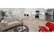 Open floor plan with living, dining, and kitchen areas, creating a spacious and modern living space at 252 N Pennsylvania St # 102, Denver, CO 80203