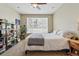Cozy bedroom with ample natural light, built-in shelving, and comfortable furnishings at 11307 Navajo Cir # A, Westminster, CO 80234