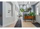 Bright foyer with tiled floors, high ceilings, decorative plant accents and neutral paint tones at 11307 Navajo Cir # A, Westminster, CO 80234