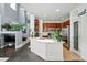 Bright kitchen featuring a breakfast bar, stainless steel appliances, and modern finishes at 11307 Navajo Cir # A, Westminster, CO 80234