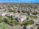 Aerial shot showcases this beautiful neighborhood filled with tree-lined streets and well-maintained lawns at 703 Tiger Lily Way, Highlands Ranch, CO 80126
