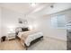 Comfortable bedroom with soft lighting, neutral tones, and a relaxing atmosphere at 703 Tiger Lily Way, Highlands Ranch, CO 80126