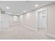 Spacious basement with door to closet, neutral carpet, and recessed lighting at 2754 S Kenton Ct, Aurora, CO 80014