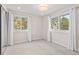 Bright bedroom with natural light from large windows and white trim at 2754 S Kenton Ct, Aurora, CO 80014