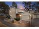 Charming townhome featuring an attached garage and well-maintained landscaping at 2754 S Kenton Ct, Aurora, CO 80014