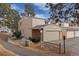 Charming townhome featuring an attached garage and well-maintained landscaping at 2754 S Kenton Ct, Aurora, CO 80014