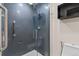 Updated shower features custom tile and glass door at 2754 S Kenton Ct, Aurora, CO 80014