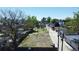 A sunny, aerial view of the vacant lot showing its proximity to a neighborhood with downtown views at 1735 W 37Th, Denver, CO 80211