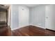 Bedroom with hardwood flooring, double closets and neutral paint at 4906 E Bates Ave, Denver, CO 80222