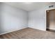 Cozy bedroom with durable carpet flooring and a neutral color scheme at 4906 E Bates Ave, Denver, CO 80222