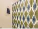 Bathroom with a modern green and blue shower curtain at 3866 S Dallas Cir # 12202, Aurora, CO 80014