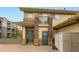 Inviting condo exterior featuring a mix of brick and siding, plus a small balcony at 3866 S Dallas Cir # 12202, Aurora, CO 80014