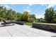 Landscaped backyard features a tiled patio and a gazebo at 5700 S University Blvd, Greenwood Village, CO 80121