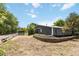 Outbuilding with a white fence, neutral paint, and lots of room at 5700 S University Blvd, Greenwood Village, CO 80121
