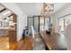 Elegant dining room with a unique light fixture and seamless access to the kitchen at 5700 S University Blvd, Greenwood Village, CO 80121