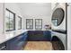 Stylish laundry room with modern appliances and custom cabinetry, maximizing functionality at 5700 S University Blvd, Greenwood Village, CO 80121