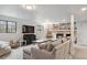 Cozy living room with brick fireplace, built in shelving, and lots of seating at 5700 S University Blvd, Greenwood Village, CO 80121