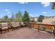 Spacious wooden deck with outdoor seating, perfect for enjoying the backyard view at 17703 E Nassau Pl, Aurora, CO 80013