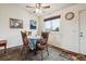 Bright dining area featuring a ceiling fan and natural light at 17703 E Nassau Pl, Aurora, CO 80013