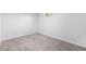 Empty bedroom features neutral carpet, a window and white walls at 7600 Kearney Dr, Commerce City, CO 80022