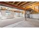 Unfinished basement with exposed beams and potential for customization at 10806 Crooke Dr, Parker, CO 80134