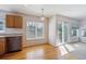 Cozy breakfast nook with backyard access and bright light from the large picture window at 10806 Crooke Dr, Parker, CO 80134