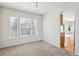 Cozy dining area with ample natural light and neutral carpeting at 10806 Crooke Dr, Parker, CO 80134