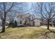 Two-story home with a front lawn, attached garage, and covered front porch at 10806 Crooke Dr, Parker, CO 80134