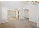 Spacious living area with an open layout and abundant natural light, perfect for entertaining at 10806 Crooke Dr, Parker, CO 80134