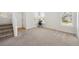 Neutral living room with natural lighting, plush carpeting, and a cozy ambiance at 10806 Crooke Dr, Parker, CO 80134