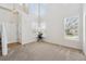 Airy living room with lots of windows that flood the room with natural light at 10806 Crooke Dr, Parker, CO 80134