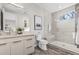 Modern bathroom with a large walk-in shower at 7036 E Archer Pl, Denver, CO 80230