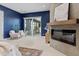 Main bedroom with fireplace, sliding doors to balcony at 7036 E Archer Pl, Denver, CO 80230